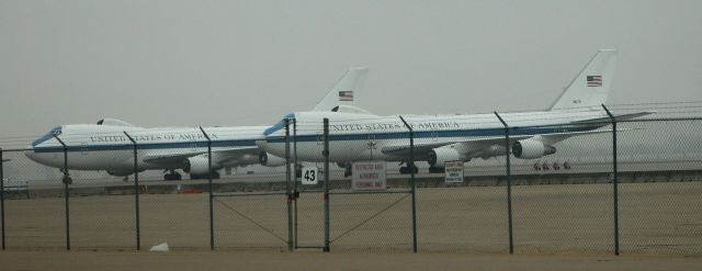 73-1676 — - 12/31/21 E4B 73-1676 and 75-0125 parked at west ramp 