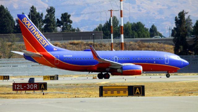 Boeing 737-700 (N258WN) - Holding short 30R for take off