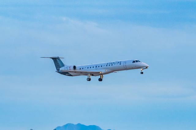 Embraer ERJ-135 (N915JX) - A JSX ERJ135 in Starlink special livery landing at PHX on 2/19/23. Taken with a Canon T7 and Tamron 70-200 G2 lens.