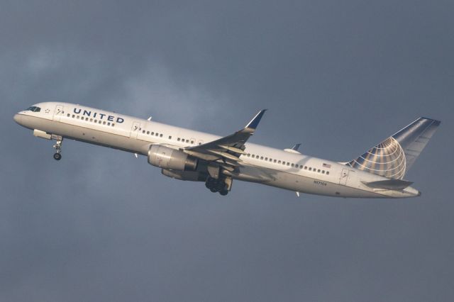 Boeing 757-200 (N17104) - UAL80 departing into snowy skies.