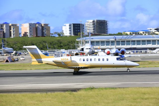 Bombardier Learjet 75 (N6DA) - N6DA departing TNCM