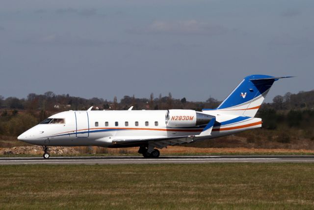 Canadair Challenger (N283DM) - Departing rwy 26 at EGGW on 23-Apr-13 operating flight TWY44 to KMHT.