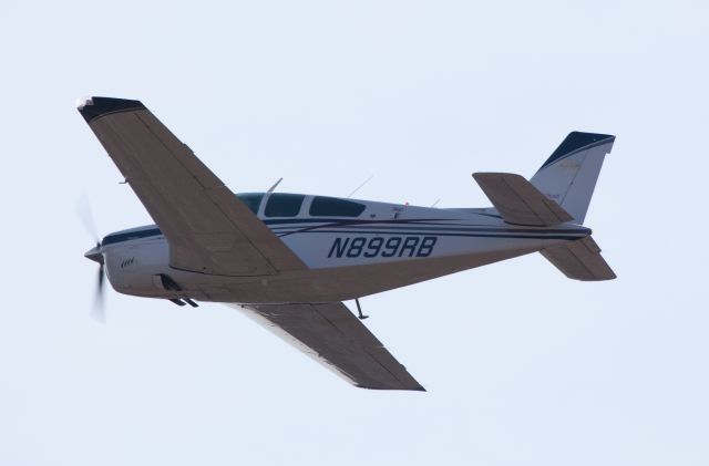 Beechcraft Bonanza (33) (N899RB) - Departure RW 08 at KDXR