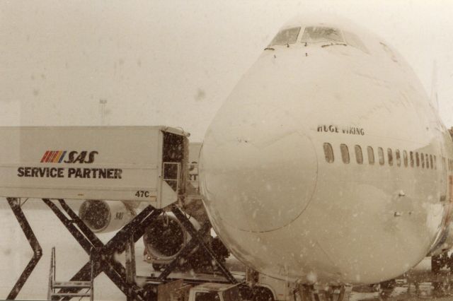 Boeing 747-200 (LN-RNB) - Snow  falling on SAS Huge Viking at Arlanda, Stockholm Airport, before boarding.br /It was January 1995