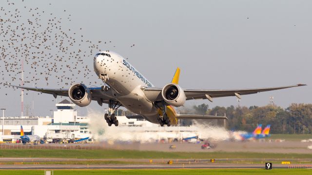 BOEING 777-200LR (N774SA) - Runway 27 departure