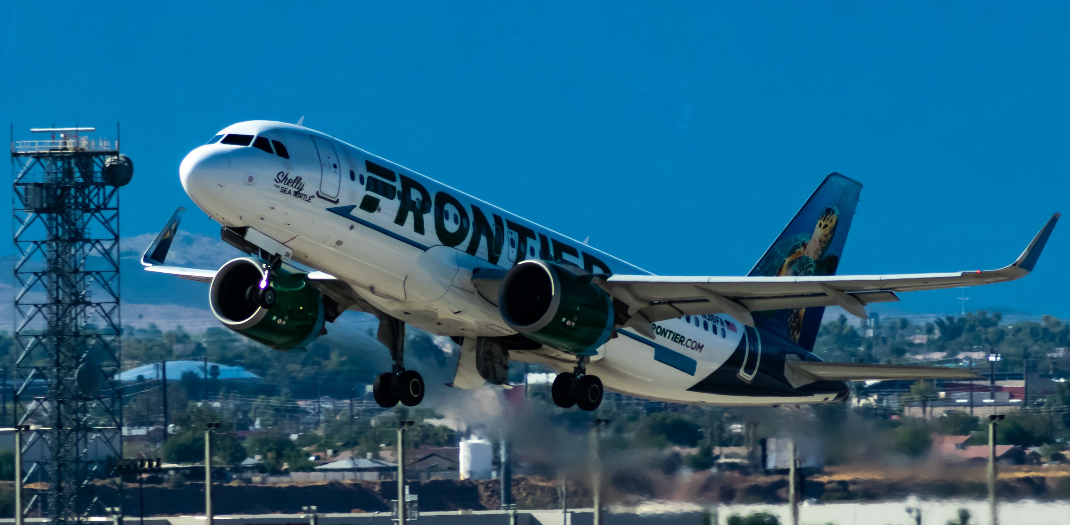 Airbus A320 (N316FR) - Shelly the Sea Turtle Departing RWY 7L