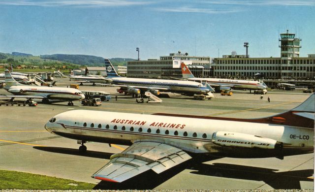 SUD-EST SE-210 Caravelle (OE-LCO) - This is a Post Card I purchased in the early 1970's. I did not photograph this image. It depicts a number of aircraft at the airport in Zurich Switzerland. The Austrian Airlines is a SE-210 Caravelle twin engine jet. Boarding and departing the aircraft is all done by those portable staircases that mesh with the cabin doors.br /No Gangways, Skybridges or Jet Bridges back then.  Iberia, KLM Royal Dutch Airlines, and Swissair joing the Caravelle on the Tarmac.