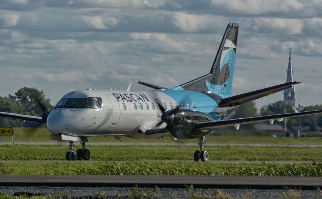 Saab 340 (N343CJ) - Taxying to 24R in CYHU for a flight to Bangor, ME.