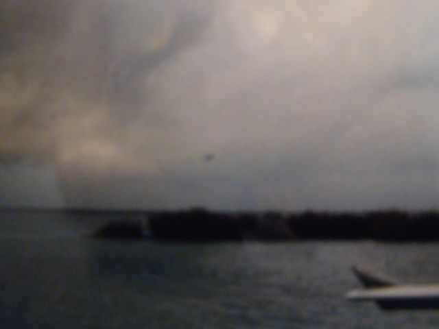 — — - In the background is Mr. Jack H. landing Gulf Oil Co. Widgeon some where in south Louisiana oil field.