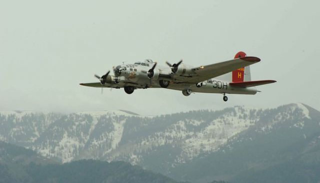 Boeing B-17 Flying Fortress (21-0256) - Evening departure on a rainy, June 4, 2010. Used by permission of the Photographer Clark Salisbury . Salisbury Photography North Logan, Utah