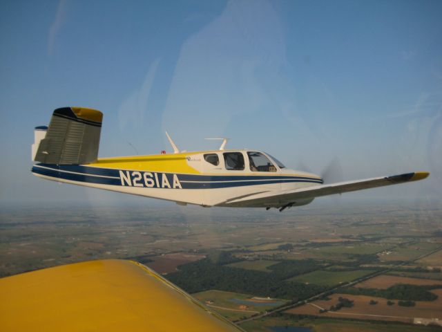 Beechcraft 35 Bonanza (N261AA) - Early morning flight.