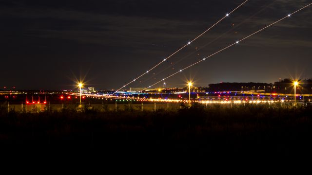 Boeing 737-700 — - Nightshot Runway 07L at Frankfurt Airport