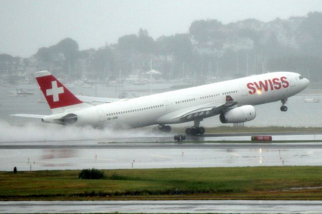 Airbus A330-300 (HB-JHM) - Swiss 55 departing for Zurich dragging some nice vapor