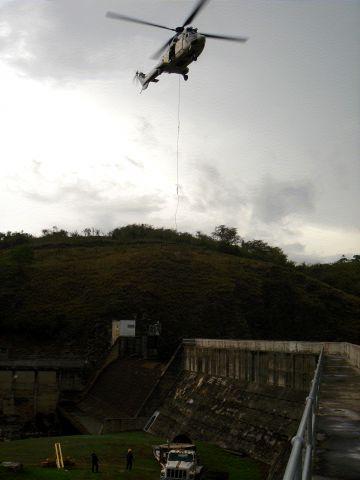 TUSAS Cougar (N5800Z) - Super Puma helicopter moving a 6,700 pounds steel drum