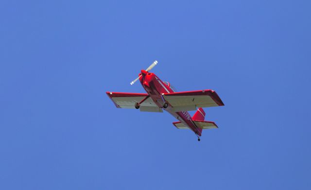 Vans RV-8 (N37PK) - With full flaps and ready to land. Fun looking airplane.