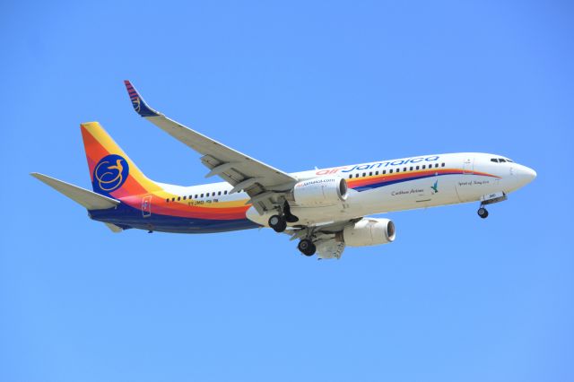 Boeing 737-700 (9Y-JMD) - A mid afternoon arrival at Toronto for this colourful bird...