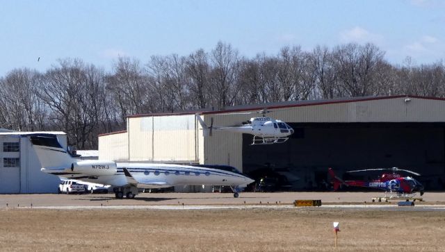 Eurocopter AS-350 AStar (N933HD) - In between the Gulfstream and the ABC TV affiliate helo "Chopper 6" is the CBS TV affiliate helo about to land which is a 2013 Eurocopter AS-350 all sharing the city ramp in the Winter of 2019.