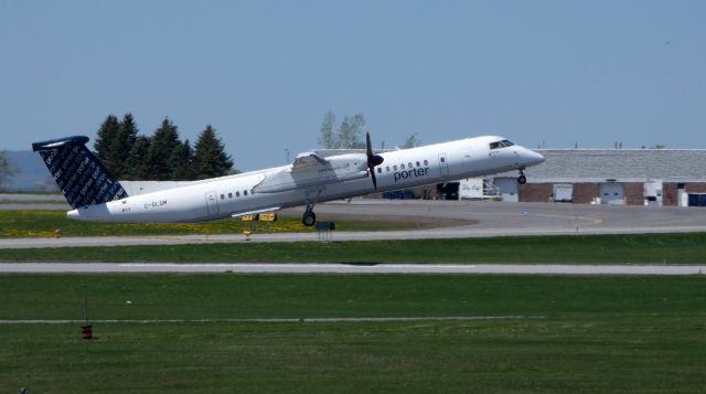 de Havilland Dash 8-400 (C-GLQM) - Shown here is a Porter Air de Havilland Dash 8-400 departing in the Spring of 2018.