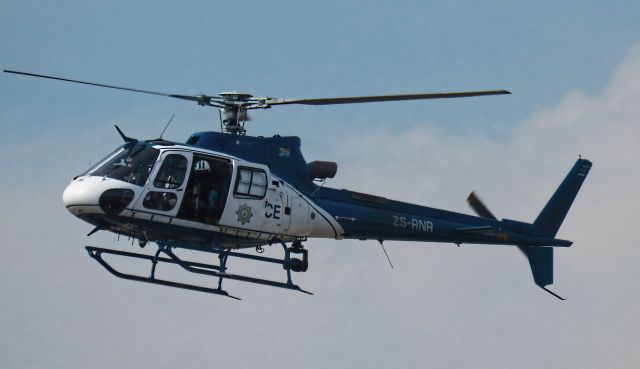 ZS-RNR — - A SAPS Helicoper tracking hijackers circles low over Johannesburg Suburbs.