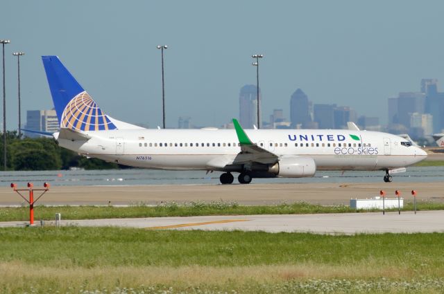 Boeing 737-800 (N76516) - Departing DFW 05/22/2013 - ECO-SKIES (Theres only one sky) Commitment To The Environment - Wonder if it runs on batteries?