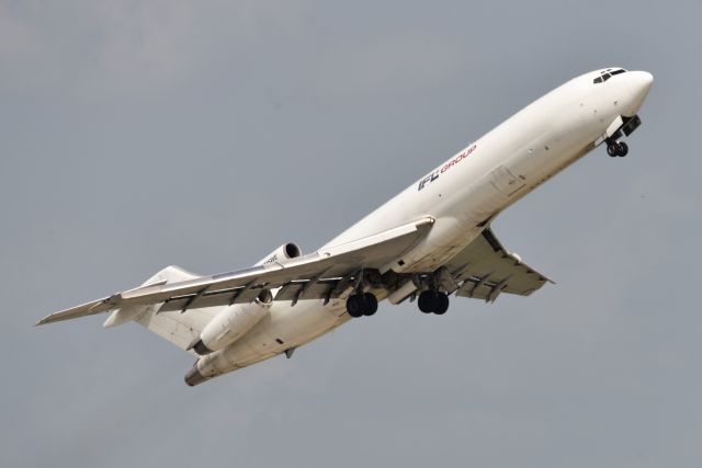 BOEING 727-200 (N215WE) - Line # 1830 out of 1832. S/N # 22936. Built in 1984 for FedEx, originally N215FE. Here she is, airborne after a surprisingly short takeoff run of less than 3000 feet. Climbed like a bat out of hell with it's tail on fire!. Departing 23-L on 07-15-21.