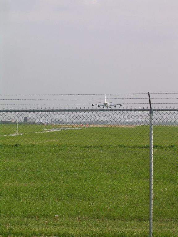 — — - RC135W doing touch n go at KLNK Rwy 18, 051111
