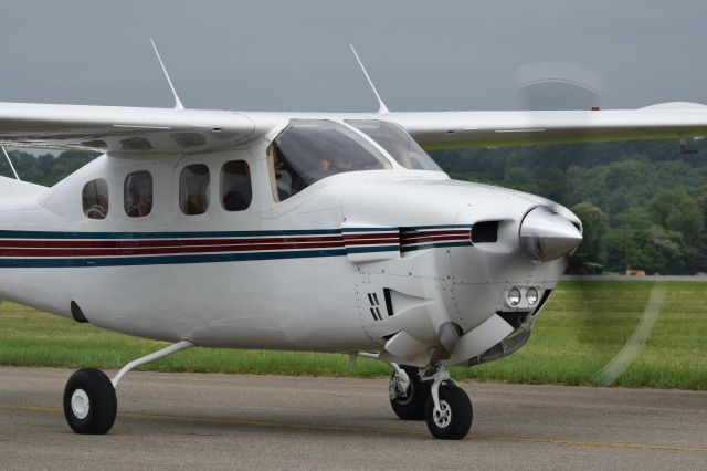 Cessna P210 Pressurized Centurion (N92CK) - Taxiing to Runway 23 at FDK from AOPA Fly-In Saturday 5-11-2019 as rain showers began to near