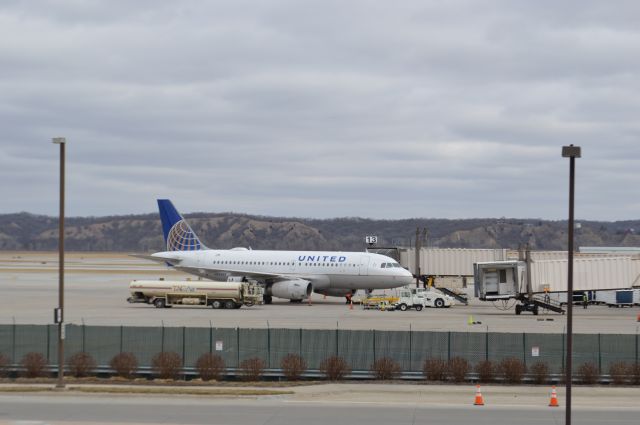 Airbus A319 (N837UA) - United 377 arrived from Denver at 12:29 P.M.  Taken March 1, 2016 with a Nikon D3200 with 18-55mm VR2 lens.  