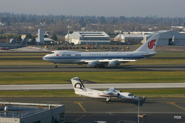 Boeing 747-400 (B-2409) - KPDX - Air China Cargo braking on Runway 10R Feb 26th, 2005.