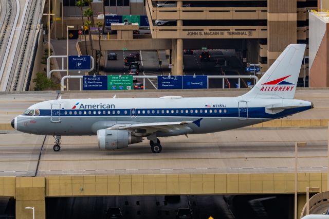 Airbus A319 (N745VJ) - An American Airlines A319 in Allegheny retro livery taxiing at PHX on 2/14/23. Taken with a Canon R7 and Canon EF 100-400 II L lens.