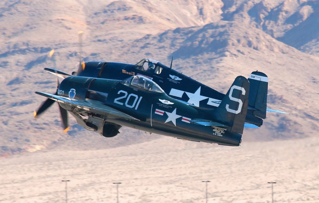 — — - Both the Hellcat and the Bearcat in the photo belong to the Commemorative Air Force.br /br /Photo taken during Aviation Nation.