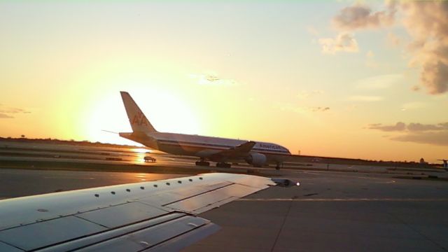 Boeing 777 — - Big daddy on his way for departure to DFW..