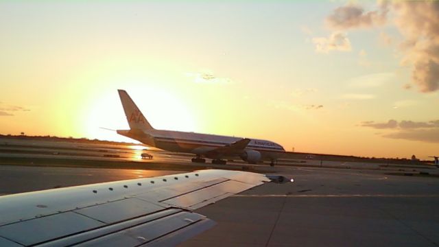 Boeing 777 — - Big daddy on his way for departure to DFW..