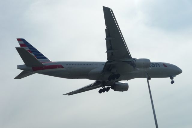 Boeing 777-200 (N758AN) - Triple Seven landing on 24R