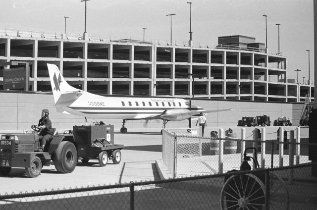 Fairchild Dornier SA-227DC Metro (N688NE) - San Jose,CA KSJC - N688NE with the  #1 engine running only preparing to do the 180 to park, I was able to get photos from the unfinished parking garage in the background.