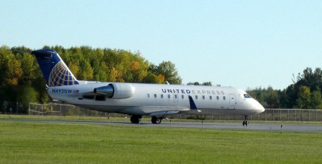 Canadair Regional Jet CRJ-200 (N492SW) - On the active runway for departure is this 1997 United Express Canadair Regional Jet 200LR from the Summer of 2021.