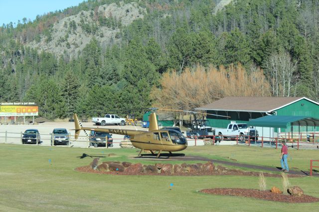 Robinson R-44 (N4344J) - 101814 R44 II on the pad at a private tour operator base near Crazy Horse monument