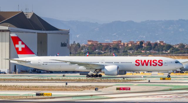 BOEING 777-300 (HB-JNF) - Landed at LAX on runway 24R, this Swiss T7 (SWR40) makes her way to TBIT through the heat haze.