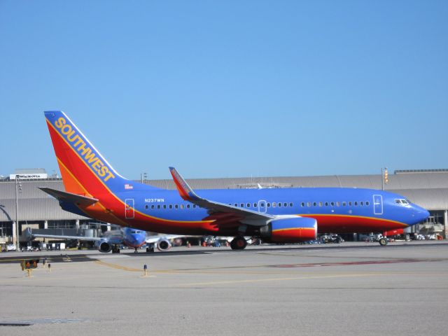 Boeing 737-700 (N237WN) - Holding on RWY 19R