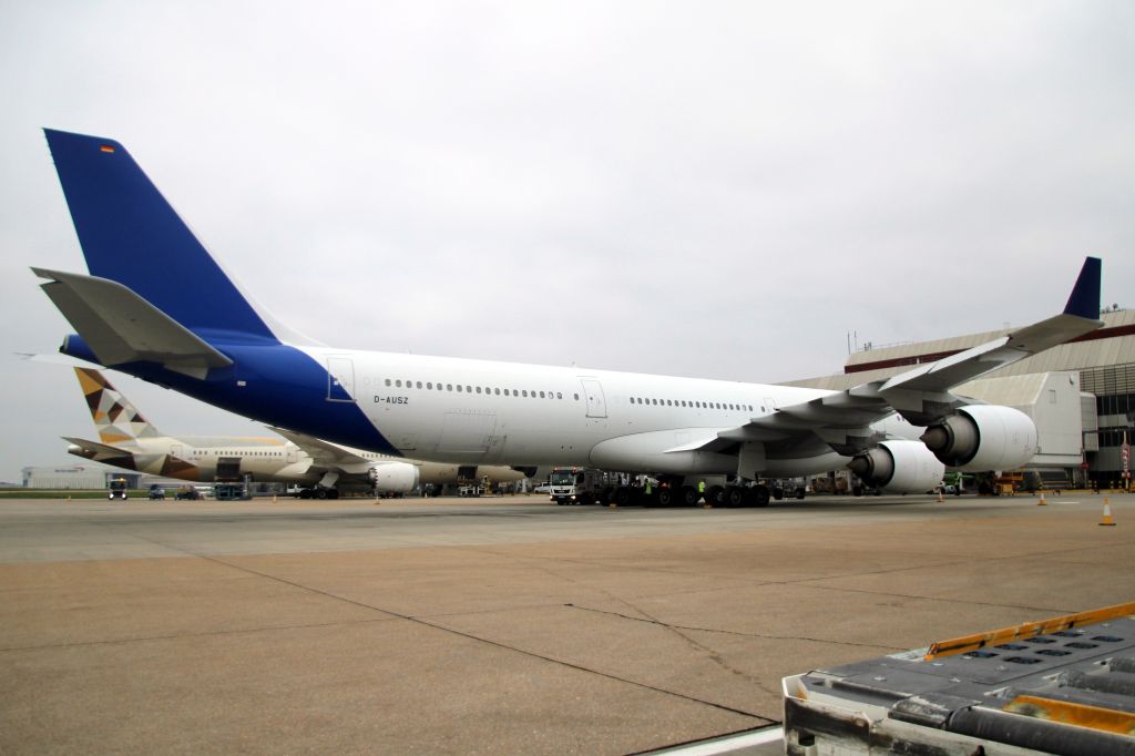 Airbus A340-600 (D-AUSZ) - Parked on Stand 411 on 3-Nov-24 after diverting here while operating Surinam Airways flight PLM993 from EHAM to SMJP.
