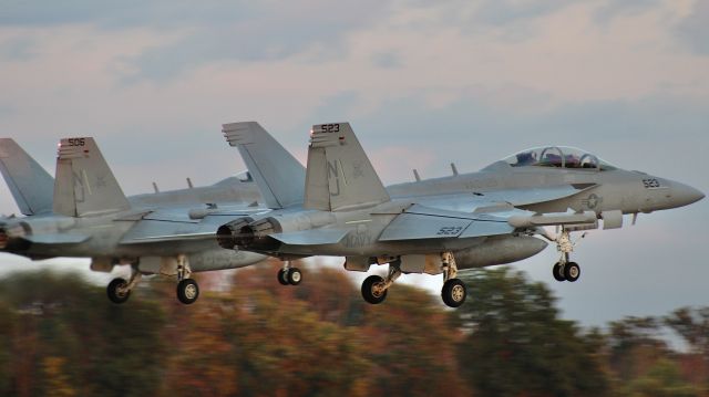 McDonnell Douglas FA-18 Hornet (16-9132) - 523 (169132) & 506 (168773) of the U.S. Navy E/A-18G Growler Demo Team, VAQ-129, blasting off of runway 18 to open up the Wednesday evening Air/Firework-Show at EAA AirVenture 2023. br /br /7/26/23