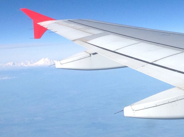 — — - Westbound flight from Azerbaijan to Paris over southern Russia, Mount Elbrus, highest point in Russia off the wing.