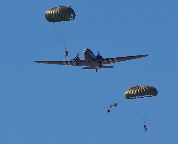 Douglas DC-3 (N87745) - Jumpers away! C-47 "Southern Cross" Performing at the 2018 Commemorative Air Force Wings Over Dallas Airshow. One of 4 Skytrains to perform a simultaneous parachute drop at the show. (Please view in "full" for highest image quality)