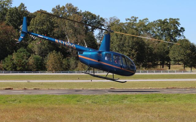 Robinson R-44 (N579DG) - Rocket City Helicopters Robinson R-44 Raven II departing St. Clair County Airport, Pell City, AL during Aviation Career Day 2022 - October 8, 2022. 