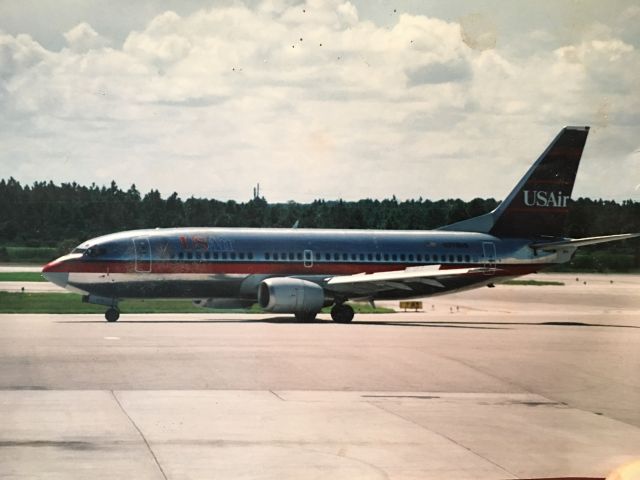 BOEING 737-300 (N273US) - USAir 737 at Fort Myers.  Taken during the mid 1990s.