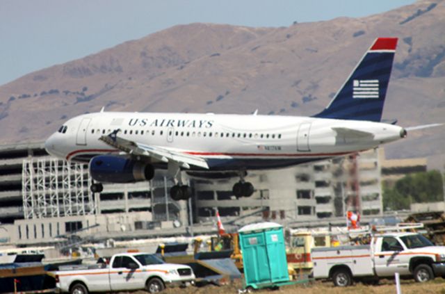 Airbus A319 (N817US) - Avoiding ground construction, On Final 30-L