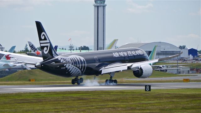 Boeing 787-9 Dreamliner (ZK-NZE) - BOE3 touches down on Rwy 16R to complete a flight test on 6/19/14. (LN:169 / cn 34334).