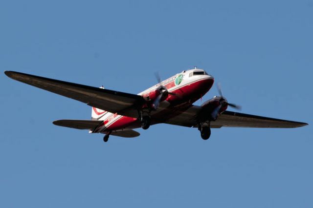 Douglas DC-3 (N728G) - 1/5/13: Troy Plastics 1942 Douglas DC-3C N728G (c/n 4359) on short final approach over Miami Lakes enroute to runway 9L at Opa-locka Executive Airport. They flew nonstop from Troy, Alabama, presumably bringing in fans for the BCS Championship game between Alabama and Notre Dame.