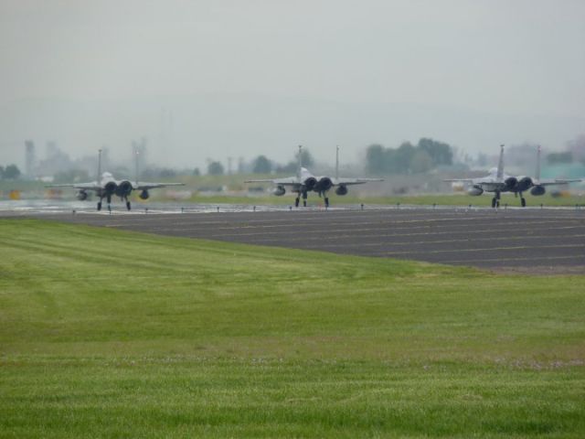 McDonnell Douglas F-15 Eagle (N492) - Lined up three wide on 28L on a real grey day.