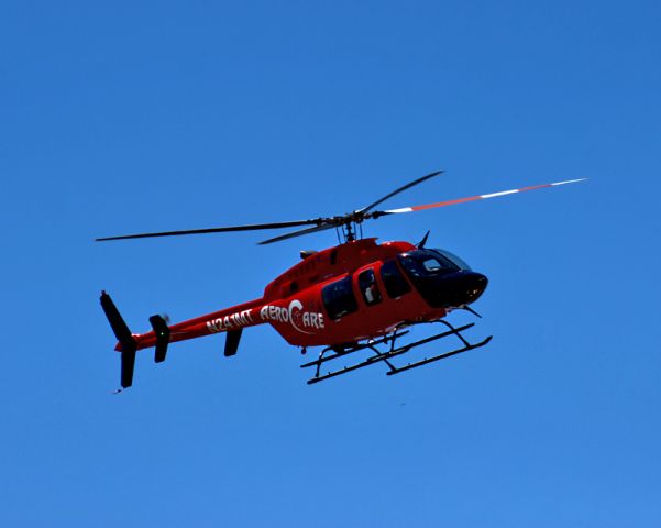 Bell 407 (N241MT) - AeroCare 7 taking off from HOB at the Hobbs Fly In, June 2016